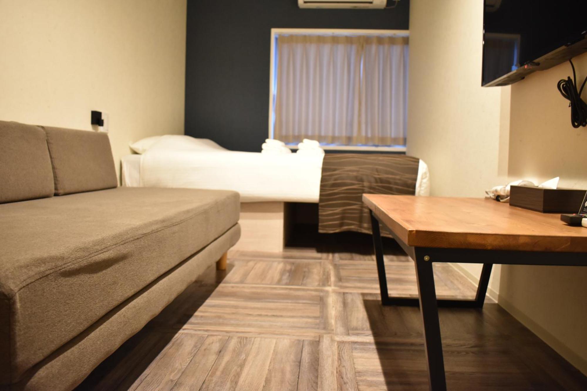 Shinsaibashi House Hotel Осака Стая снимка