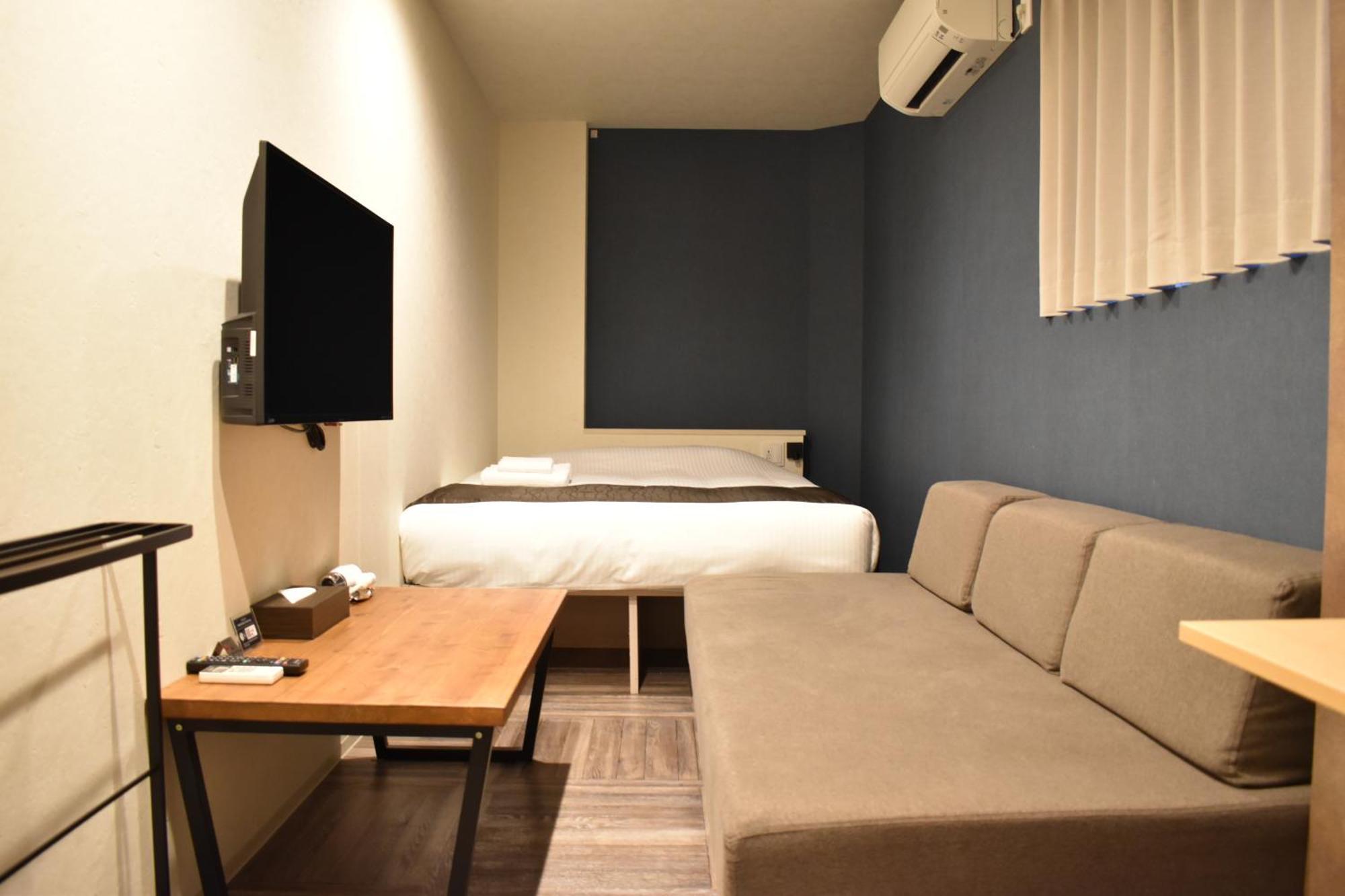 Shinsaibashi House Hotel Осака Стая снимка