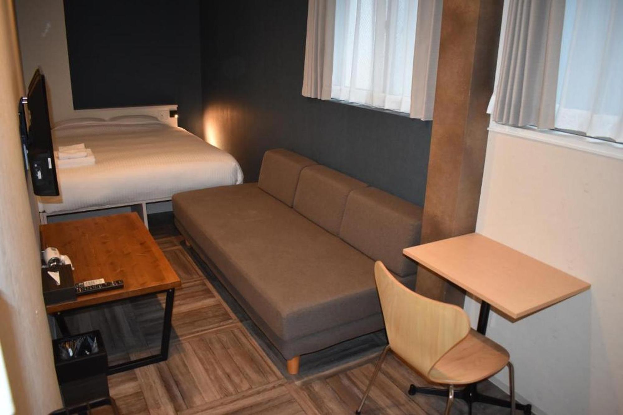 Shinsaibashi House Hotel Осака Стая снимка