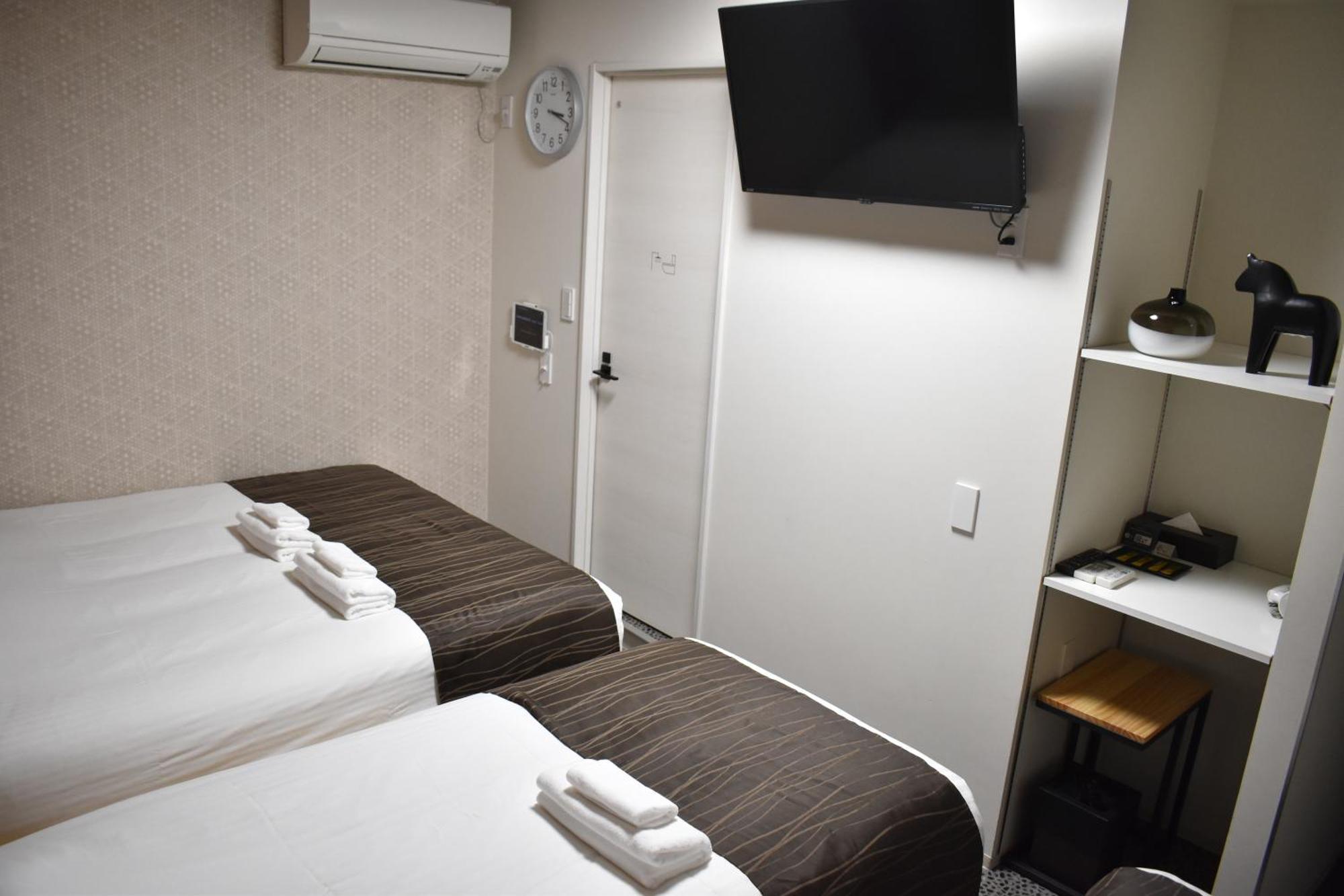 Shinsaibashi House Hotel Осака Стая снимка