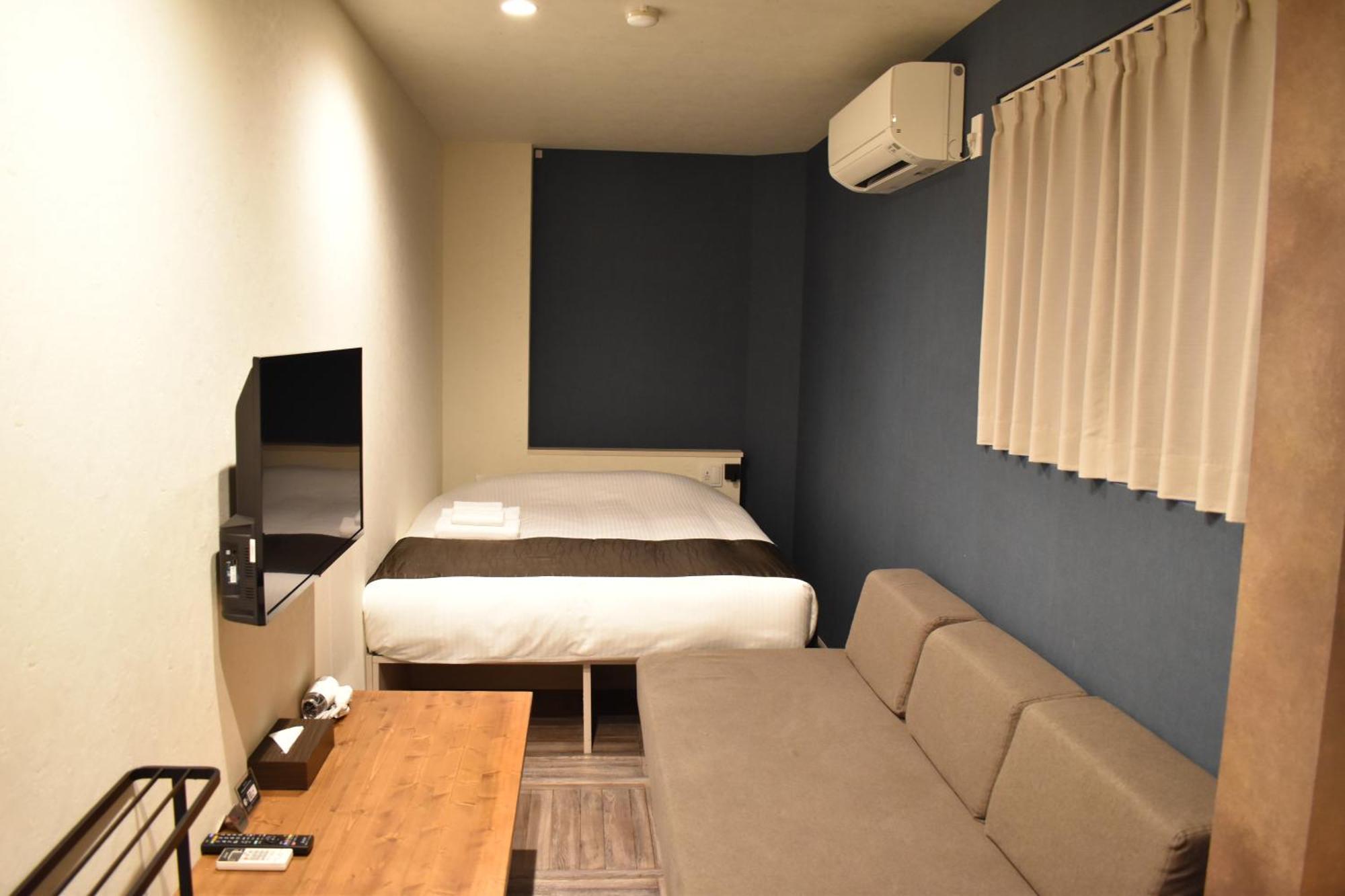 Shinsaibashi House Hotel Осака Стая снимка